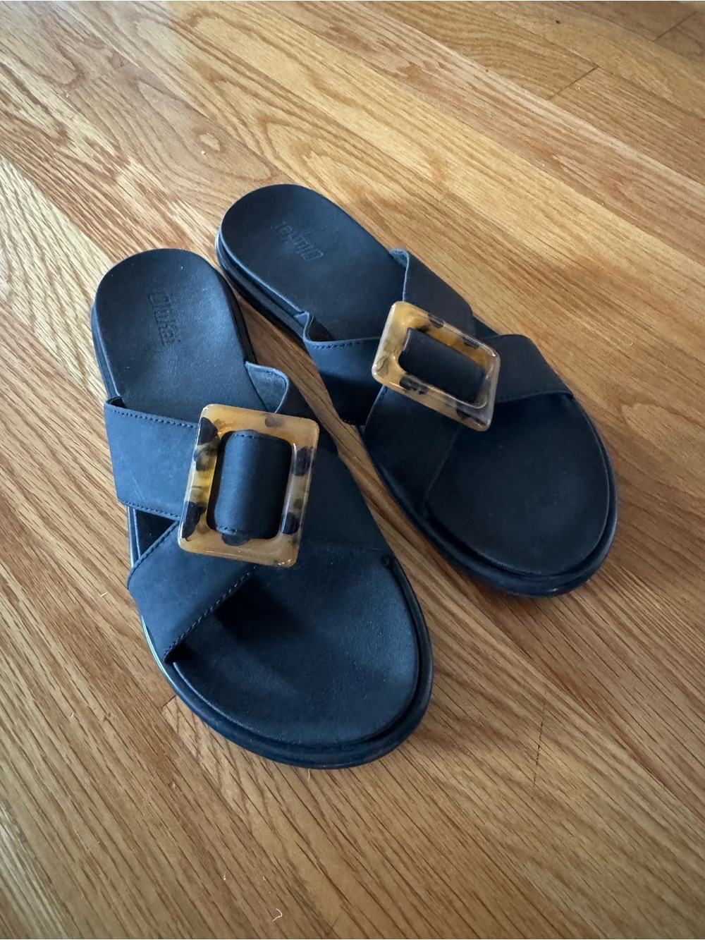 OluKai Black Slide Sandals with Tortoiseshell Buckles